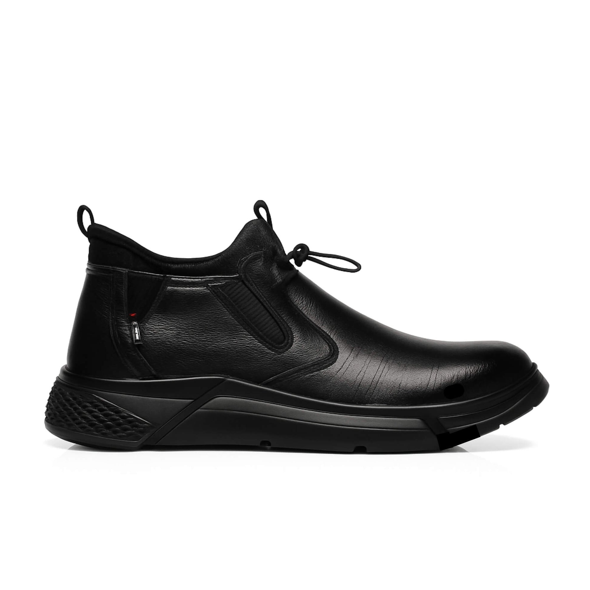 Zapato de seguridad Slip-On 182 unisex diseño sin cordones color negro con punta reforzada y suela antideslizante Vista lateral izquerda